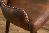 Viking Chic Barrel Chair with Nailhead Detail