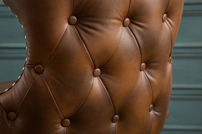 Viking Chic Barrel Chair with Nailhead Detail