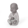 Serene Outdoor Monk Sculpture
