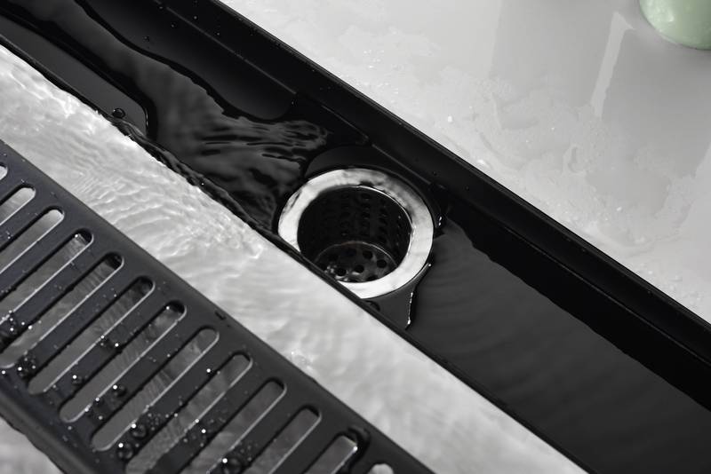 Sleek Shower Drain with Removable Grate and Hair Trap