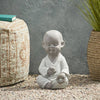 Serene Outdoor Monk Sculpture