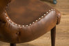 Viking Chic Barrel Chair with Nailhead Detail