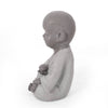 Serene Outdoor Monk Sculpture