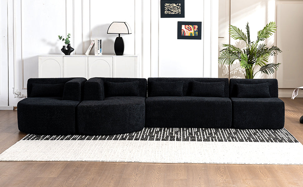 Chic Black Modular Sofa with Loungers and Plush Pillows