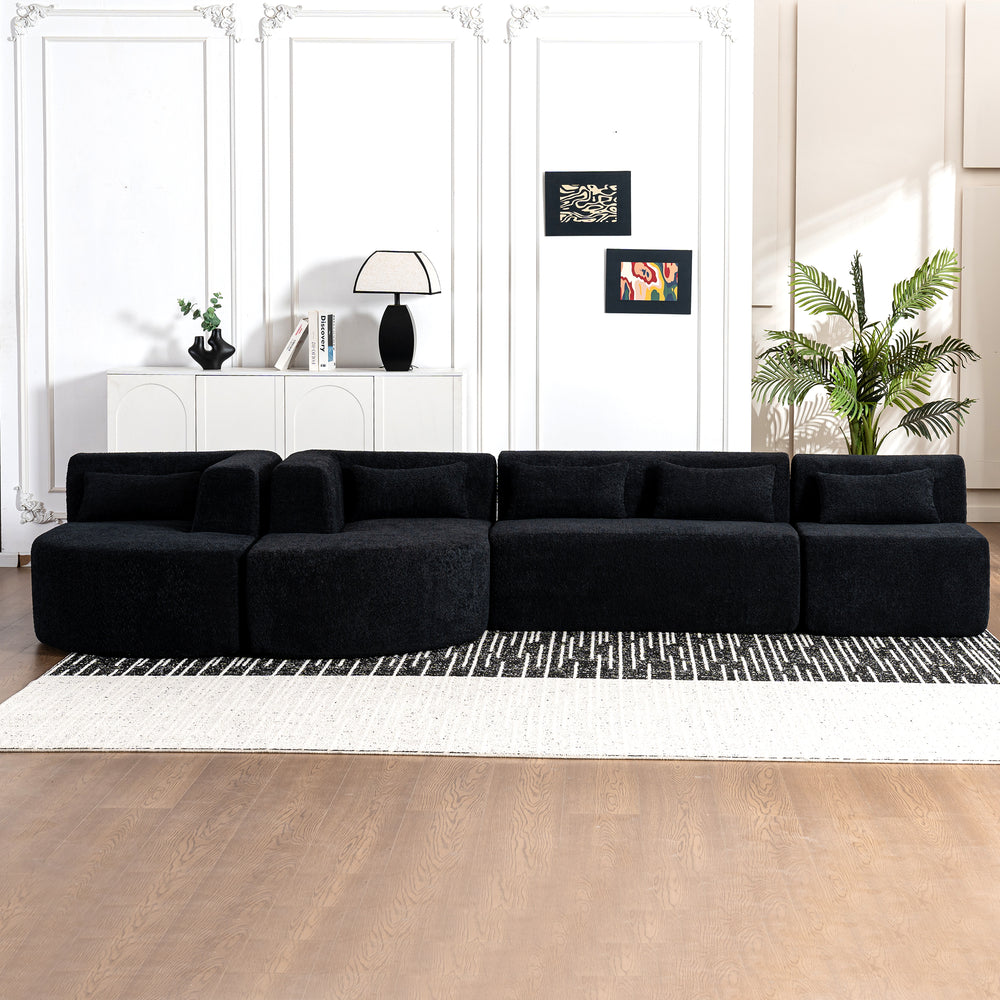 Chic Black Modular Sofa with Loungers and Plush Pillows