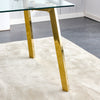 Gleaming Gold Glass Dining Table