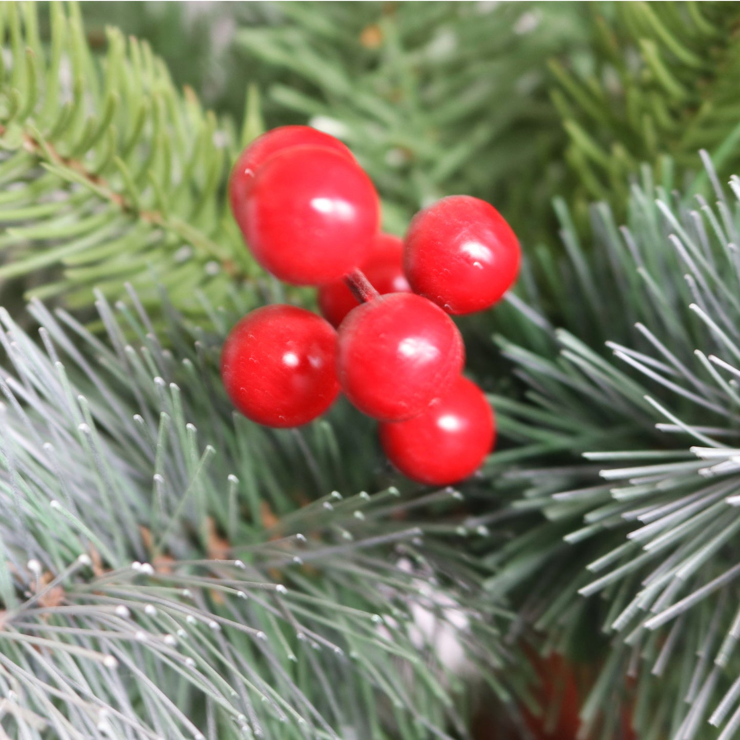 Cozy Flocked Pine Christmas Tree with Berries and Cones