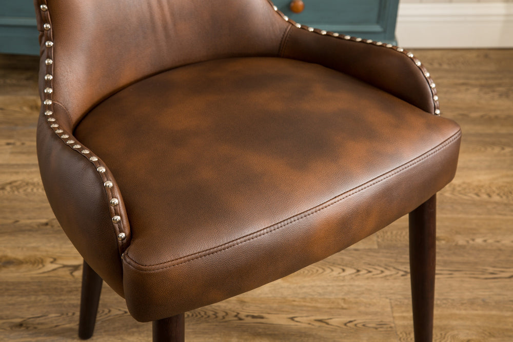 Cozy Brown Barrel Chair with Chic Button Back