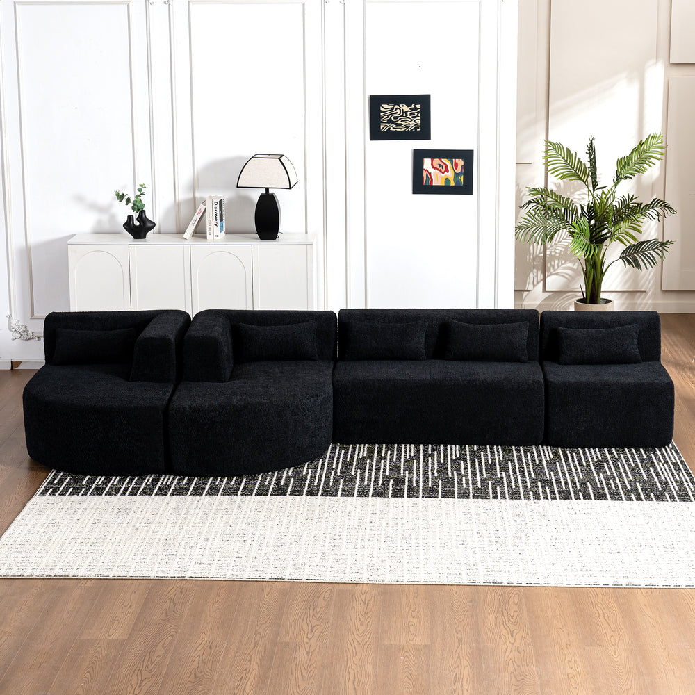 Chic Black Modular Sofa with Loungers and Plush Pillows