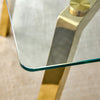 Gleaming Gold Glass Dining Table