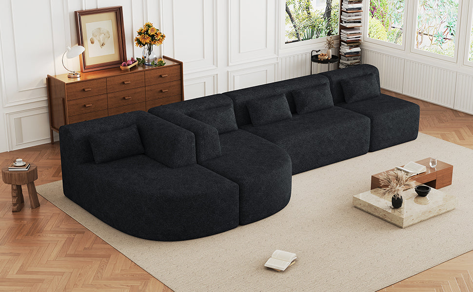 Chic Black Modular Sofa with Loungers and Plush Pillows