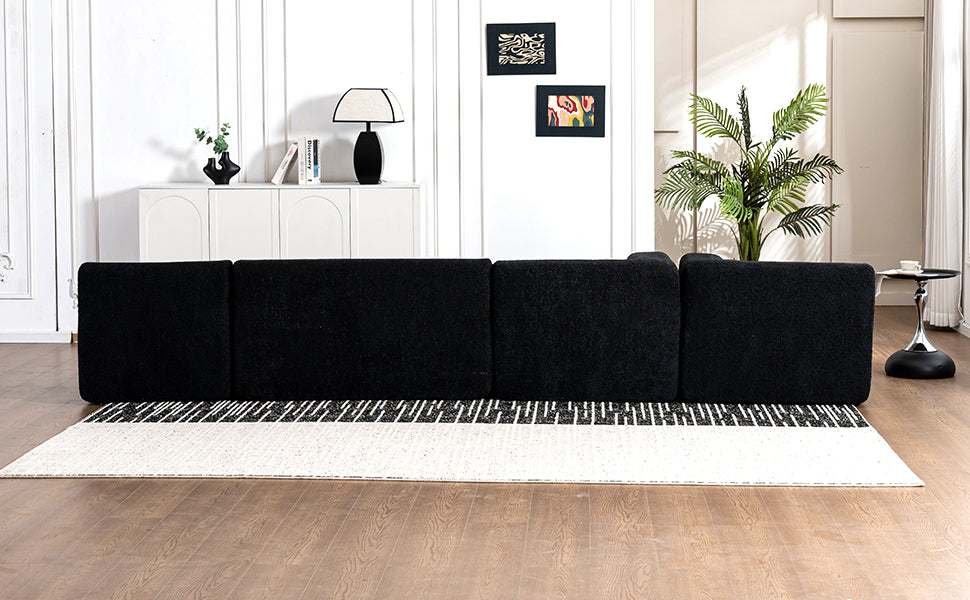 Chic Black Modular Sofa with Loungers and Plush Pillows