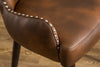 Cozy Brown Barrel Chair with Chic Button Back