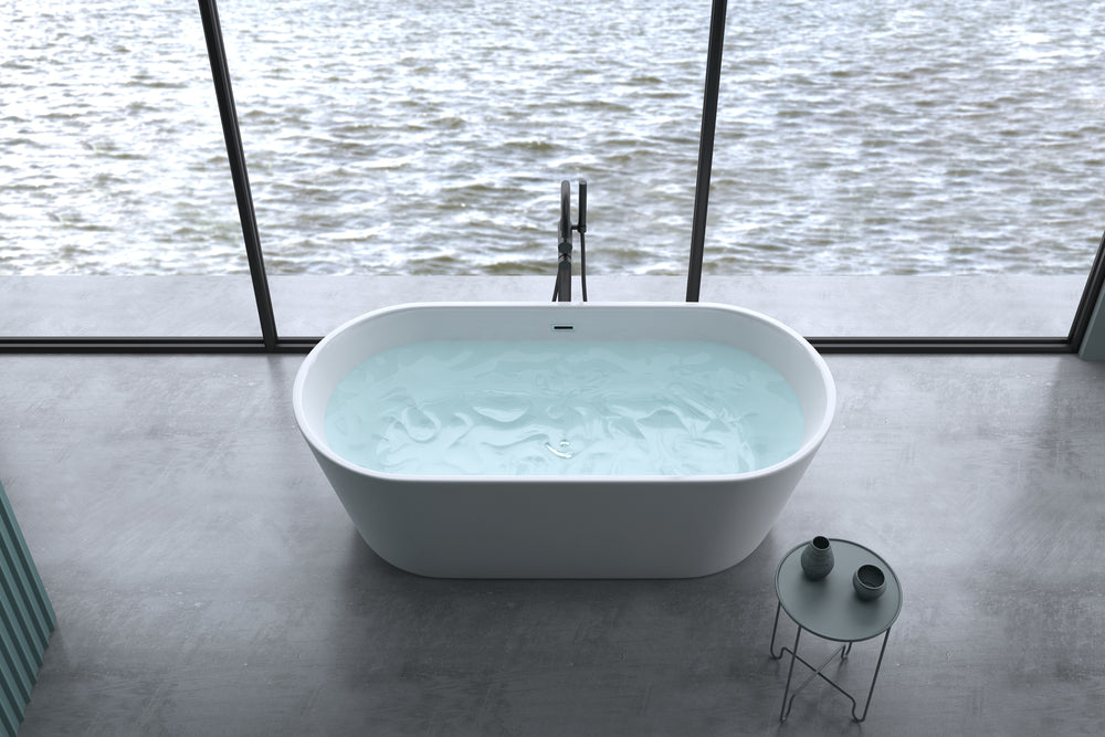 Chic White Freestanding Soaking Tub with Sleek Drain