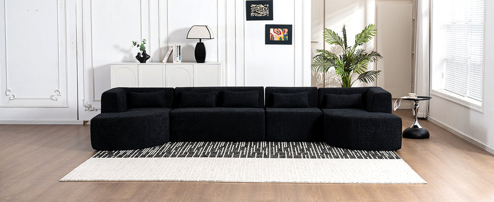 Chic Black Modular Sofa with Loungers and Plush Pillows