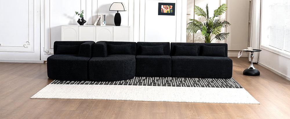 Chic Black Modular Sofa with Loungers and Plush Pillows