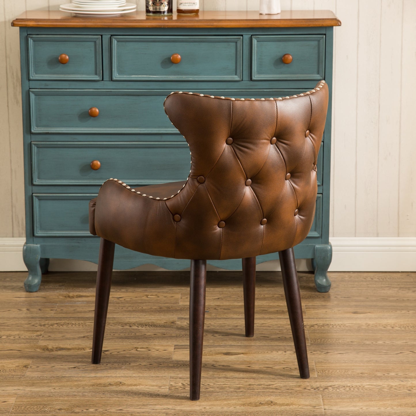 Cozy Brown Barrel Chair with Chic Button Back