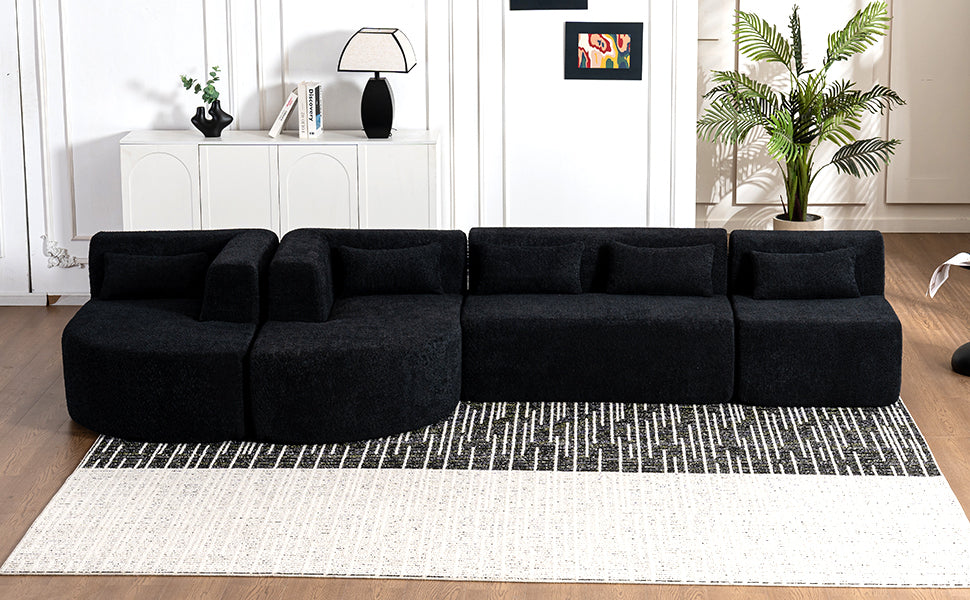 Chic Black Modular Sofa with Loungers and Plush Pillows