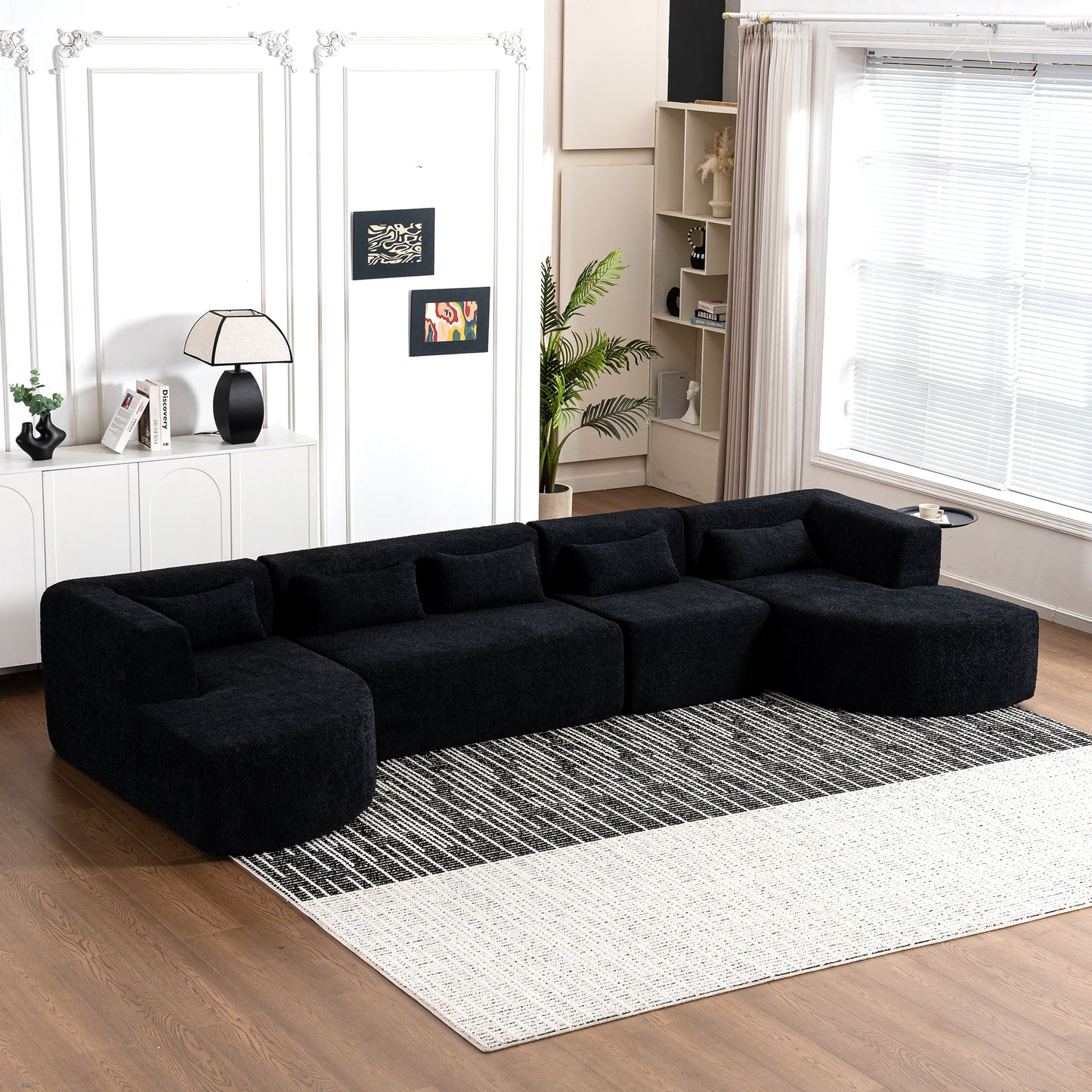 Chic Black Modular Sofa with Loungers and Plush Pillows