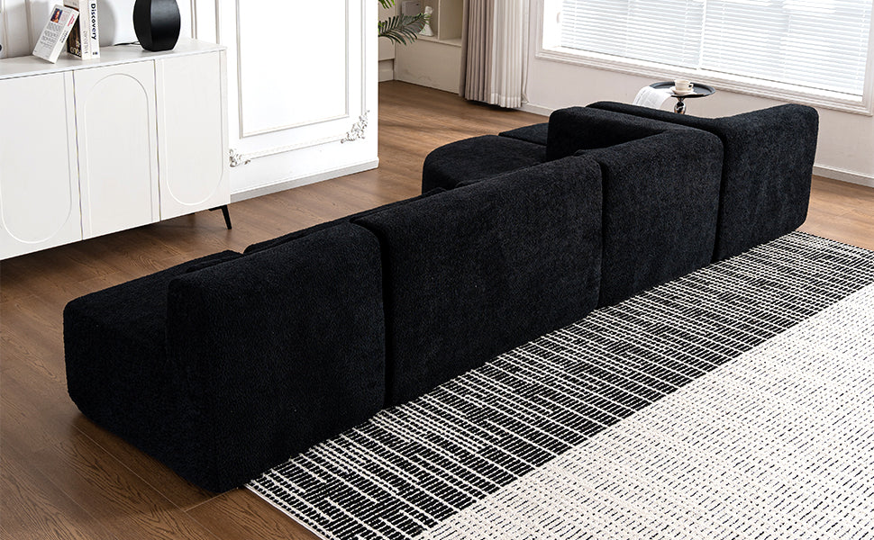 Chic Black Modular Sofa with Loungers and Plush Pillows