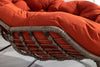 Cozy Orange Rattan Rocker