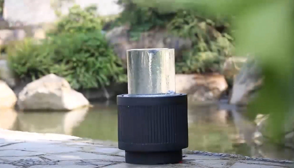 Ribbed Black Cement Outdoor Fountain with Color-Changing Light