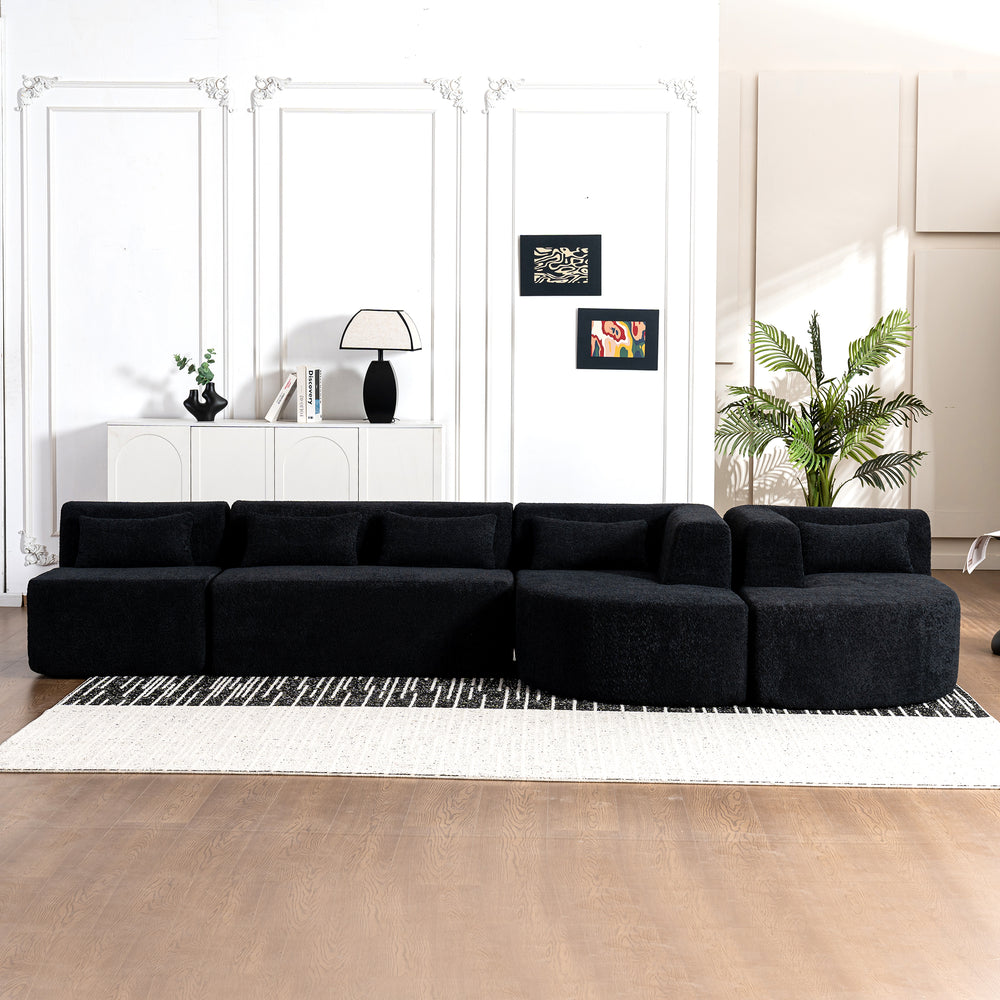 Chic Black Modular Sofa with Loungers and Plush Pillows