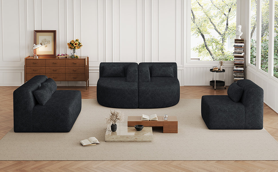 Chic Black Modular Sofa with Loungers and Plush Pillows