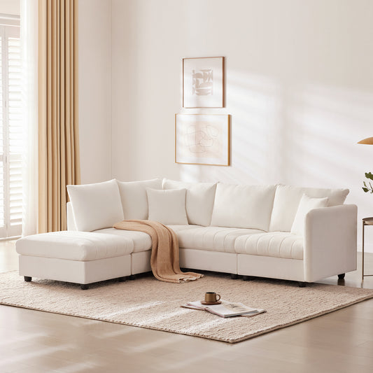 Chic Striped Sectional Sofa with Pillows and Ottoman