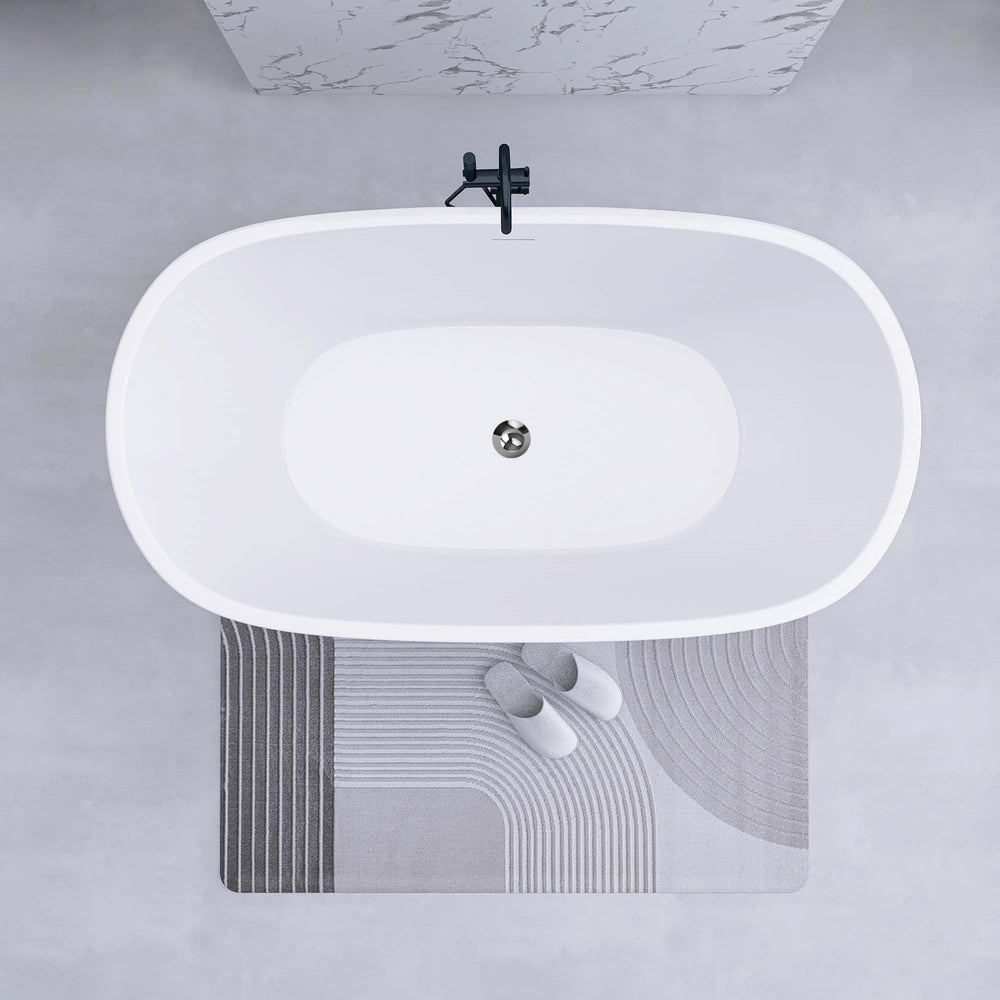 Elegant Oval Soaking Tub – Freestanding Comfort with Chrome Drain