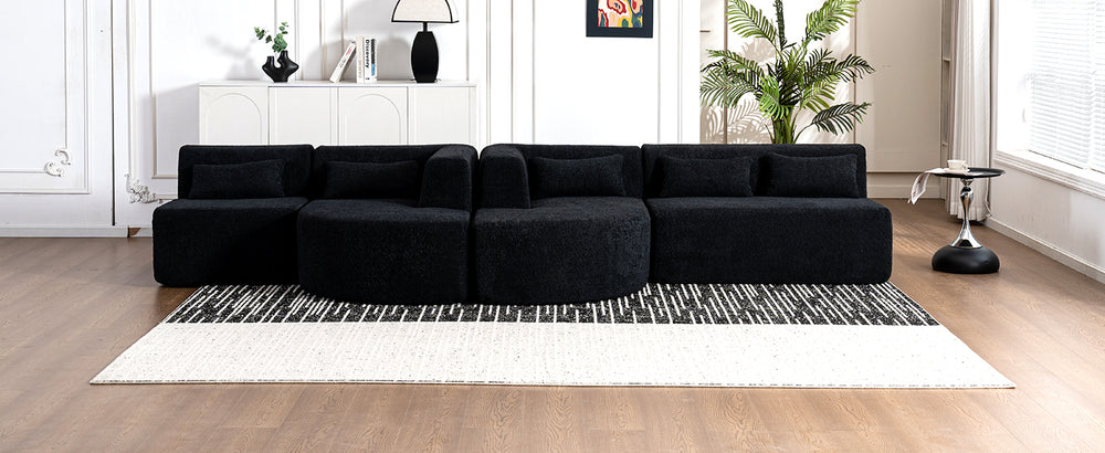 Chic Black Modular Sofa with Loungers and Plush Pillows