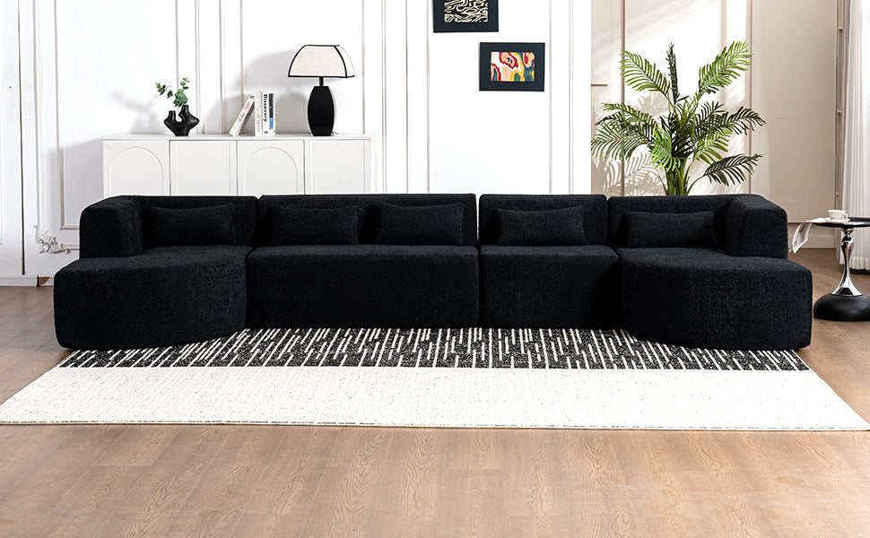 Chic Black Modular Sofa with Loungers and Plush Pillows