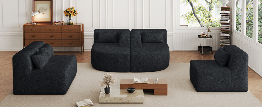 Chic Black Modular Sofa with Loungers and Plush Pillows