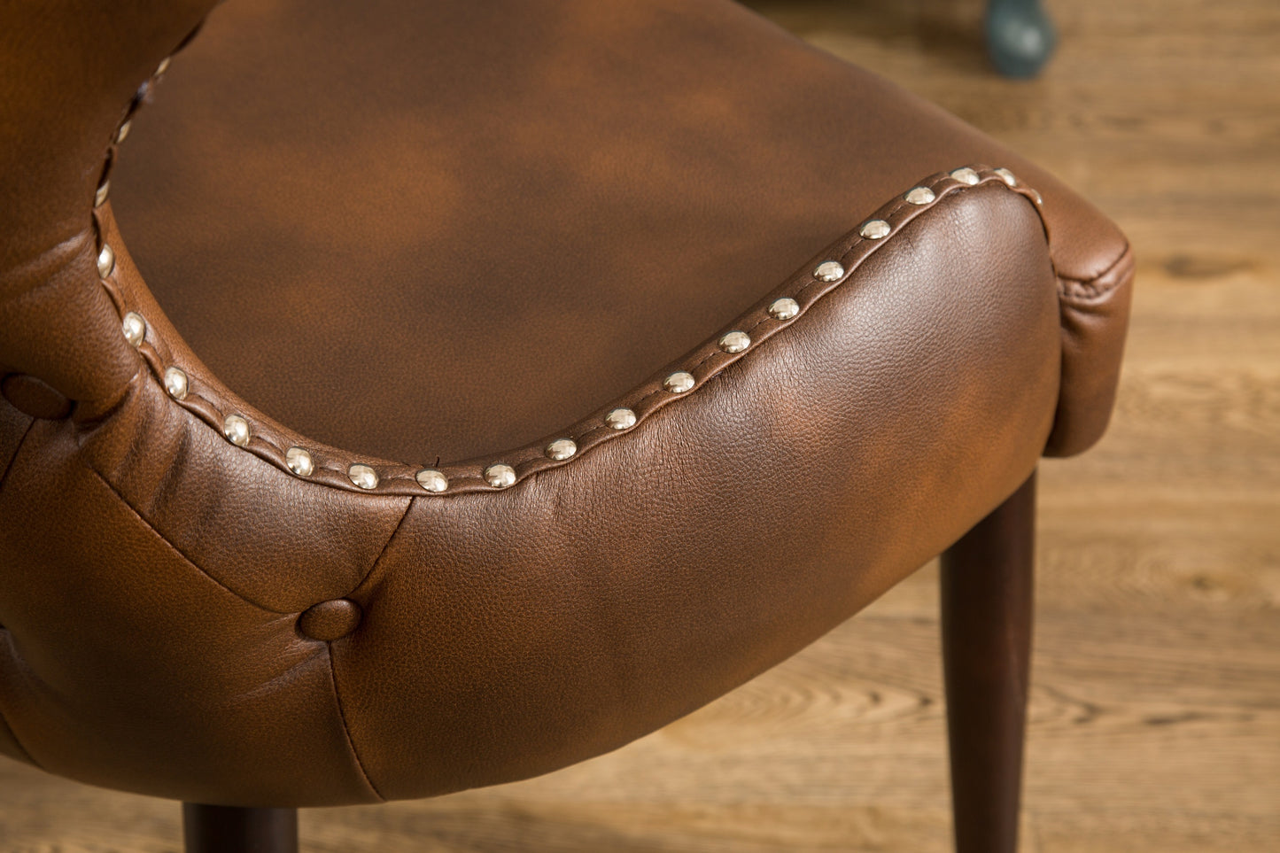 Cozy Brown Barrel Chair with Chic Button Back