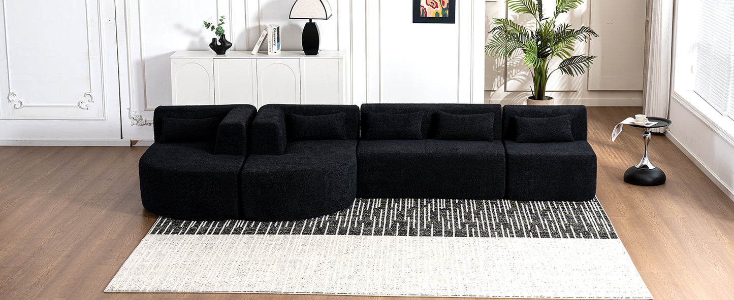 Chic Black Modular Sofa with Loungers and Plush Pillows