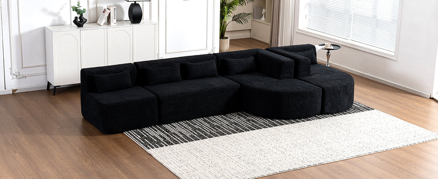 Chic Black Modular Sofa with Loungers and Plush Pillows