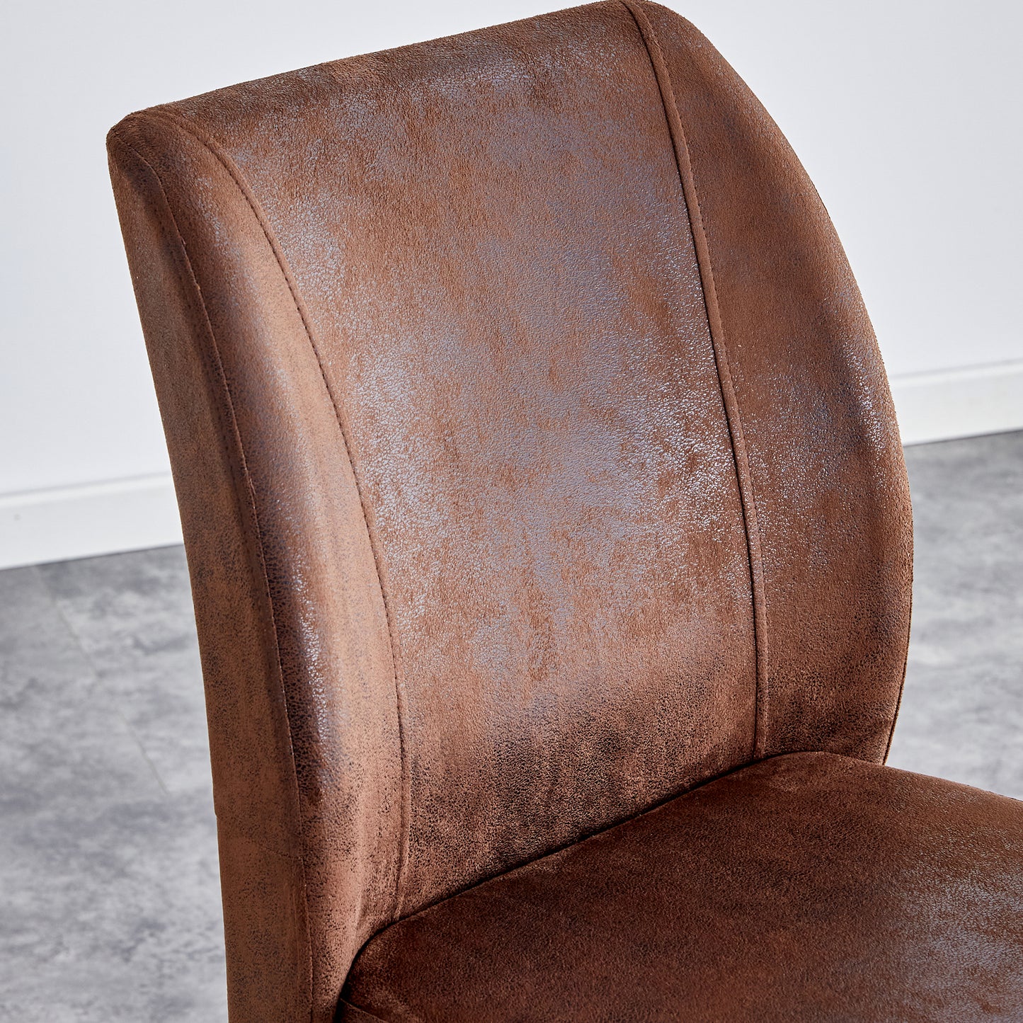 Chic Duo: Suede Cushioned Brown Chairs with Stylish Metal Legs