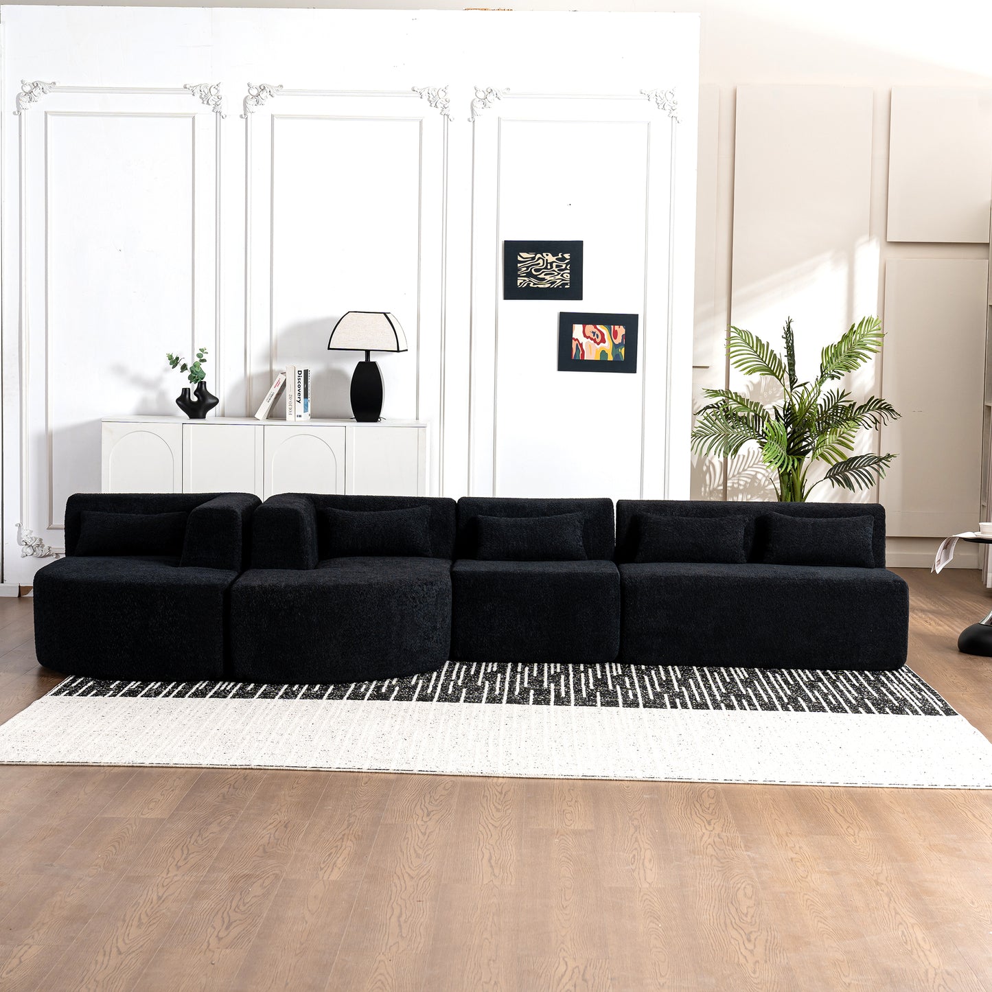 Chic Black Modular Sofa with Loungers and Plush Pillows