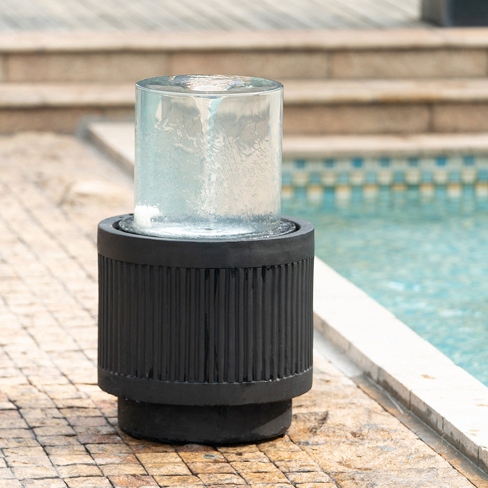 Ribbed Black Cement Outdoor Fountain with Color-Changing Light