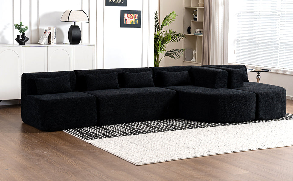 Chic Black Modular Sofa with Loungers and Plush Pillows