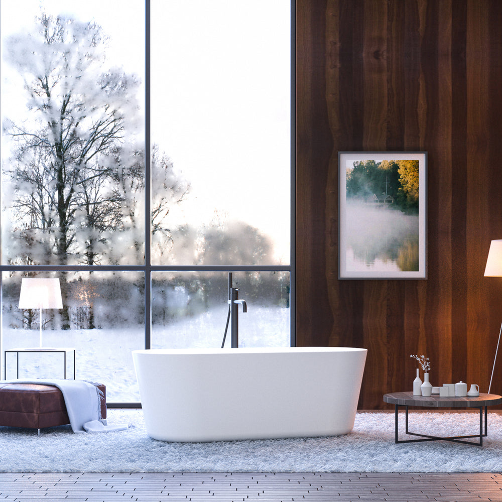 Chic White Freestanding Soaking Tub with Sleek Drain