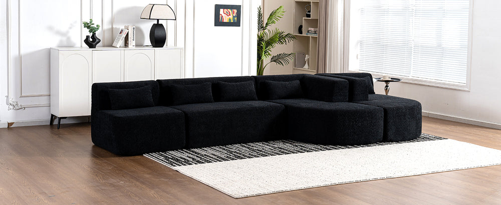 Chic Black Modular Sofa with Loungers and Plush Pillows