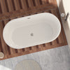 Chic White Freestanding Soaking Tub with Sleek Drain